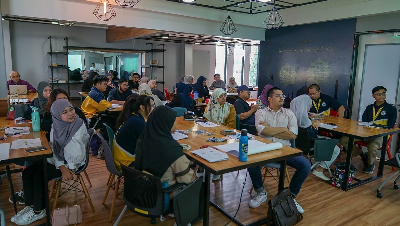 Students listening to workshop